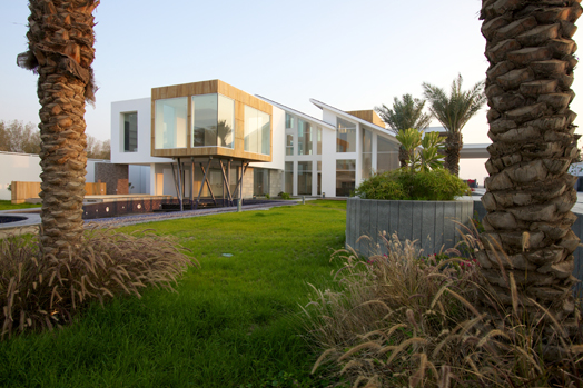 Twin-sloped roof Bungalow in Bahrain by Moriq Architects
