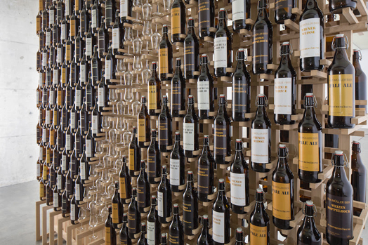 vertical craft beer bottles in storage facility