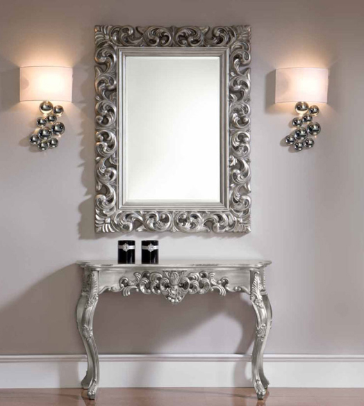 silver edged mirror frame and dresser