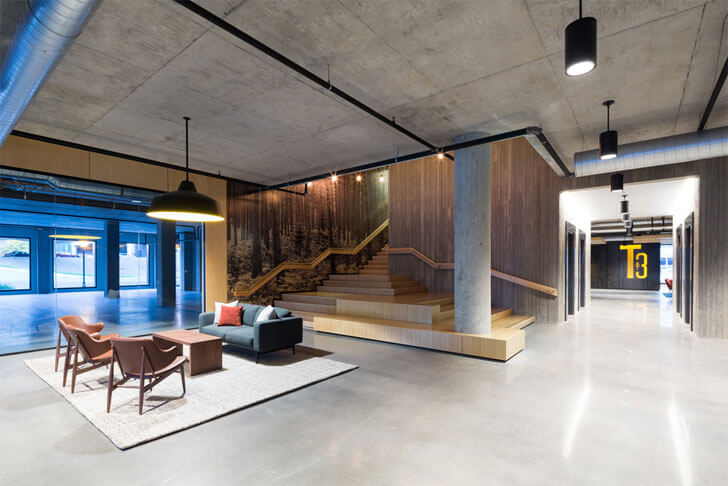“exposed concrete and wood Timber building MGArchitecture DLR Group indiaartndesign”