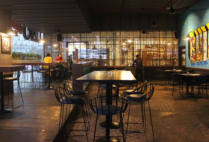 "peppy interiors Uno pizzeria Bengaluru chromed design studio indiaartndesign"