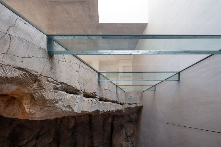 "glass inserts into rock Villa Troglodyte JPL Architects indiaartndesign"