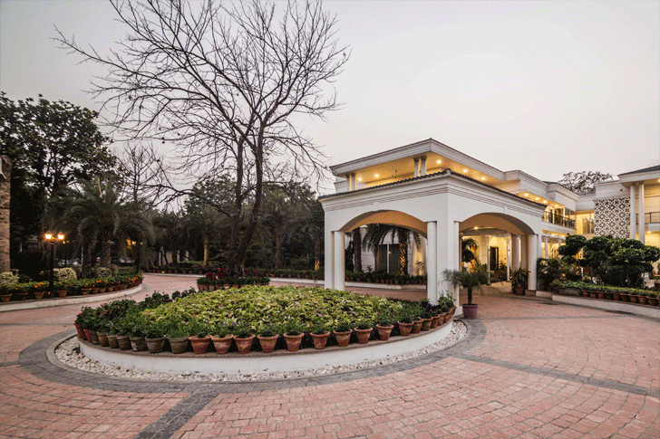 round driveway and portico