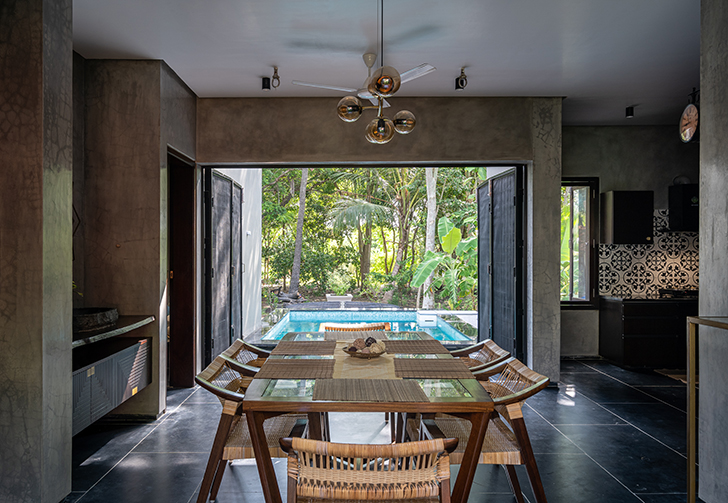 “Dining opening to deck Karaikal Farmhouse Architecture Interface indiaartndesign”