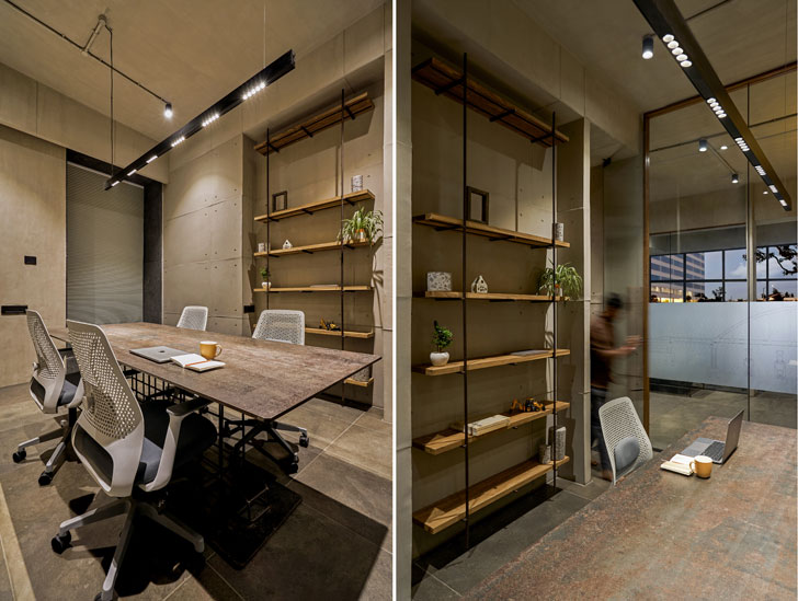 raw ambience of exposed concrete softened by warmth of wood at surat office designed by sharran architecture plus design
