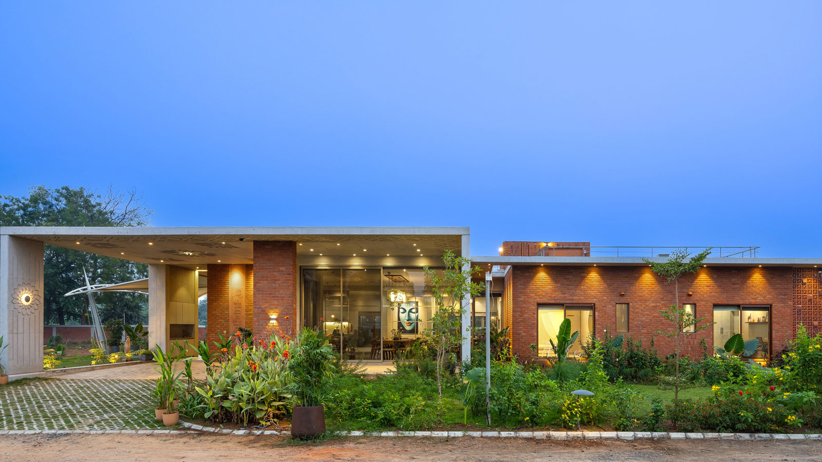 the brick and concrete house designed by jnm creatirs in vadodara