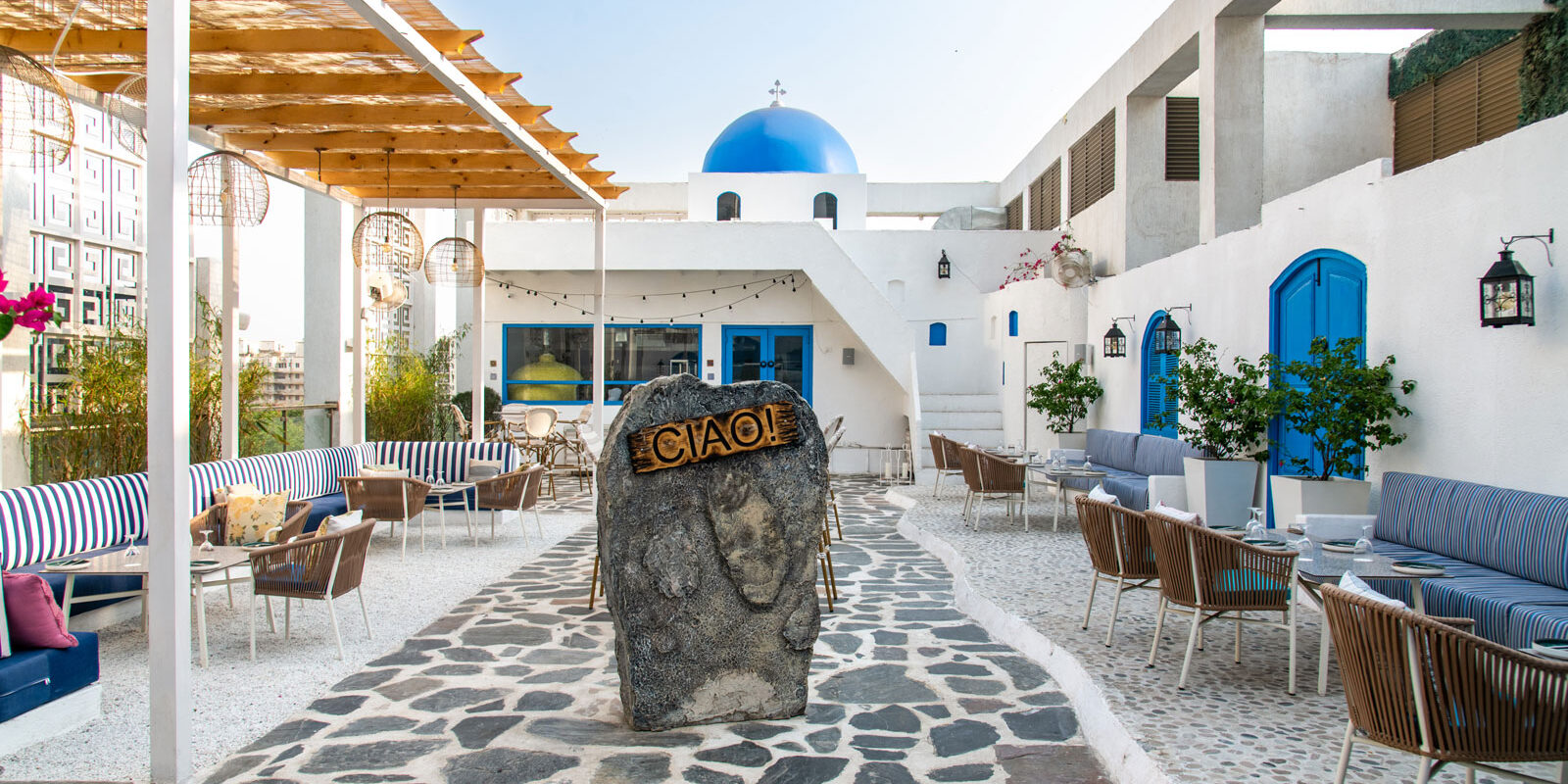 Greek-Mediterranean inspired rooftop restaurant in gurugram designed by txe designs