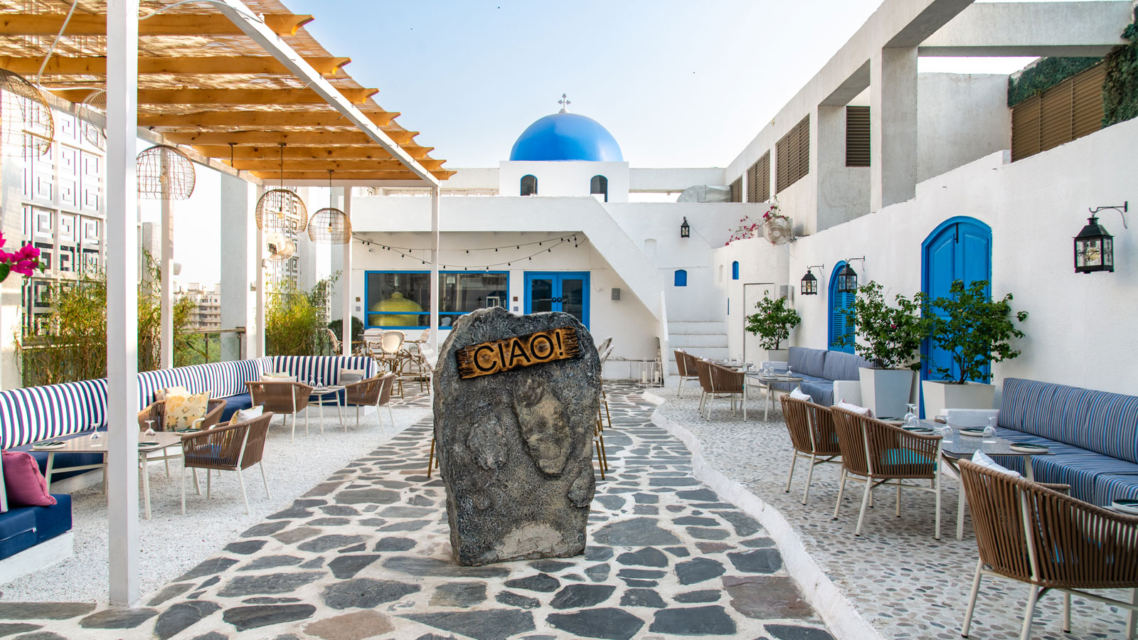 Greek-Mediterranean inspired rooftop restaurant in gurugram designed by txe designs