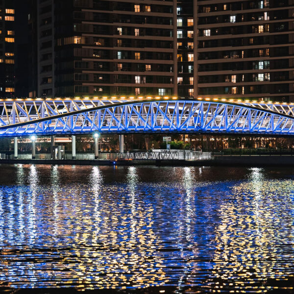 designed by hoshino architects and floating above tokyo's waterfront, Reimei Kobashi pedestrian bridge wins the architecture master prize infrastructure for 2025