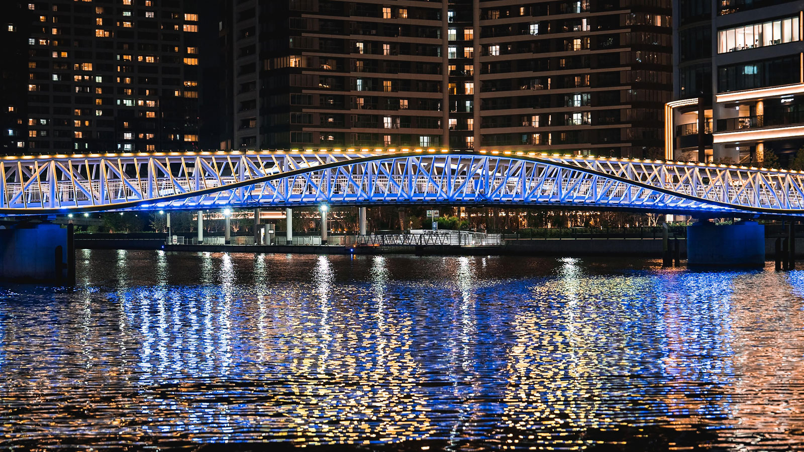 designed by hoshino architects and floating above tokyo's waterfront, Reimei Kobashi pedestrian bridge wins the architecture master prize infrastructure for 2025