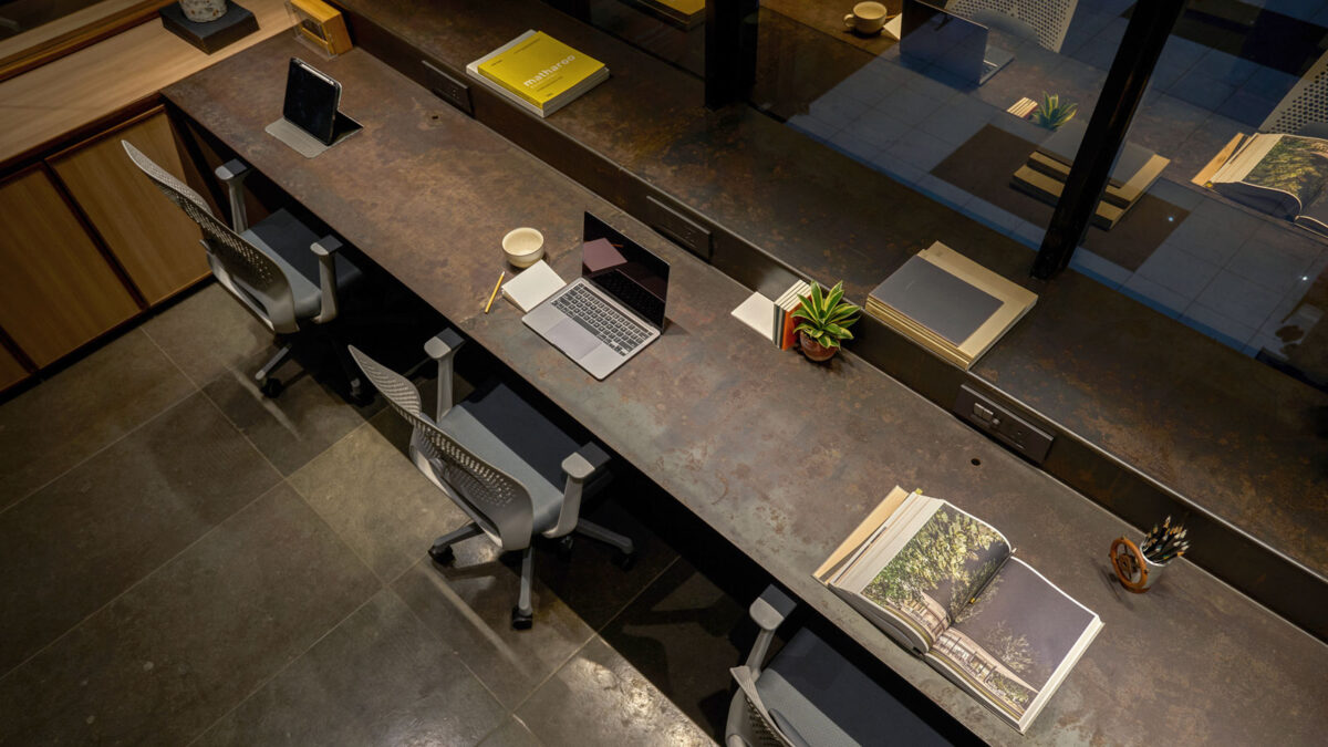 exposed concrete envelope at surat office designed by sharran architecture plus design