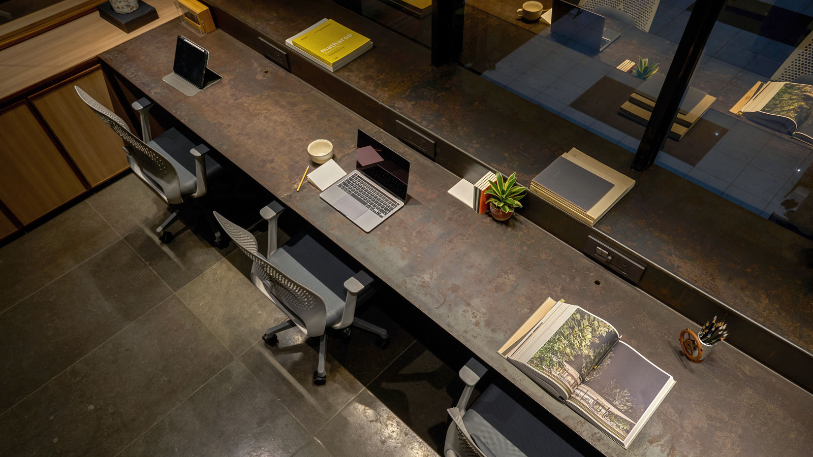 exposed concrete envelope at surat office designed by sharran architecture plus design