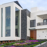 facade of a courtyard home in indore built on an artificially contourd terrain by outsidein consultants