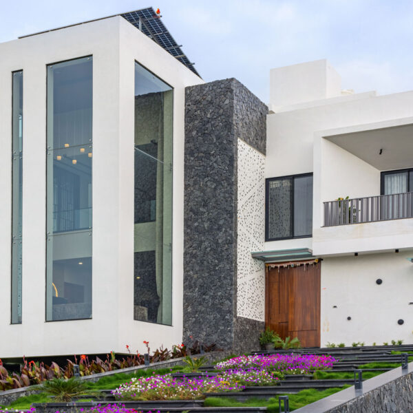 facade of a courtyard home in indore built on an artificially contourd terrain by outsidein consultants