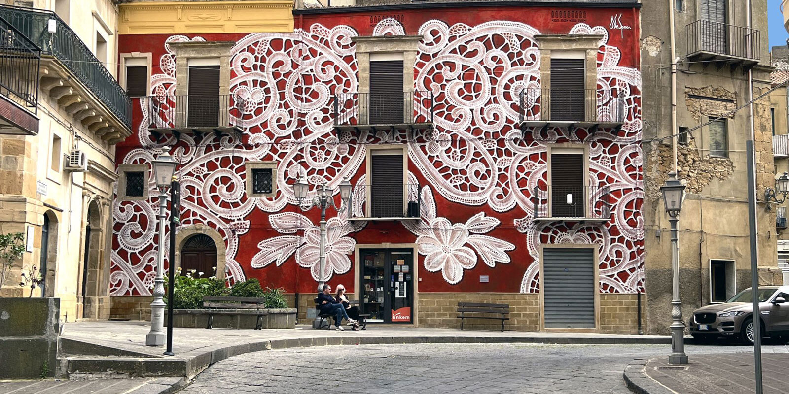lace patterns on the facade in aberdeen by artist nespoon
