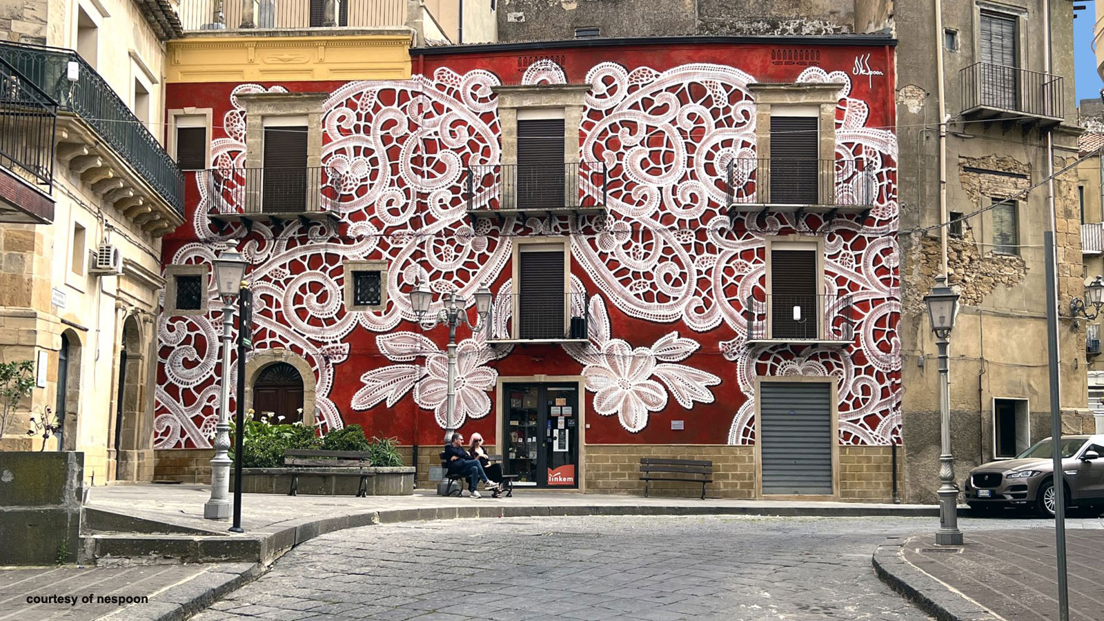 lace patterns on the facade in aberdeen by artist nespoon