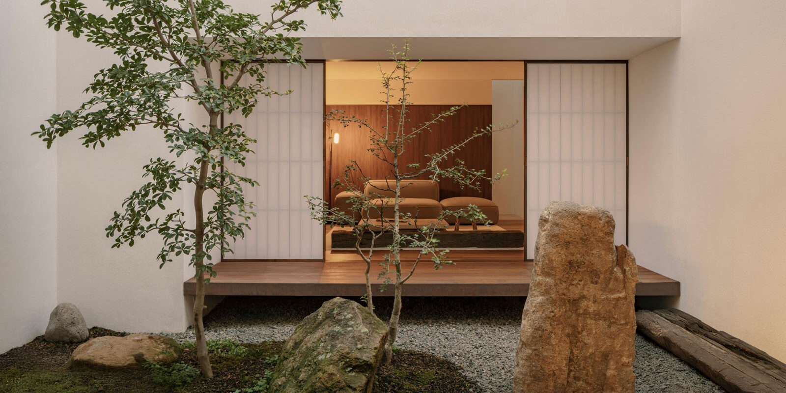 shoji screens orinet spaces around a central courtyard in the architect's own home in mexico designed by HW Studio