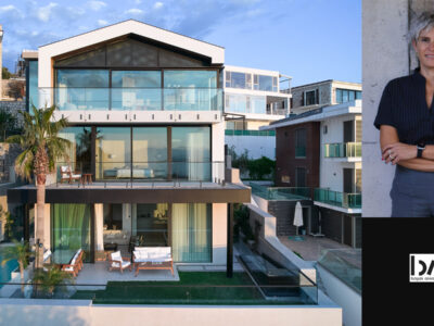 Başak Akkoyunlu Design organises a coastal residence in İzmir through sectional planning, layered privacy and framed landscape views.