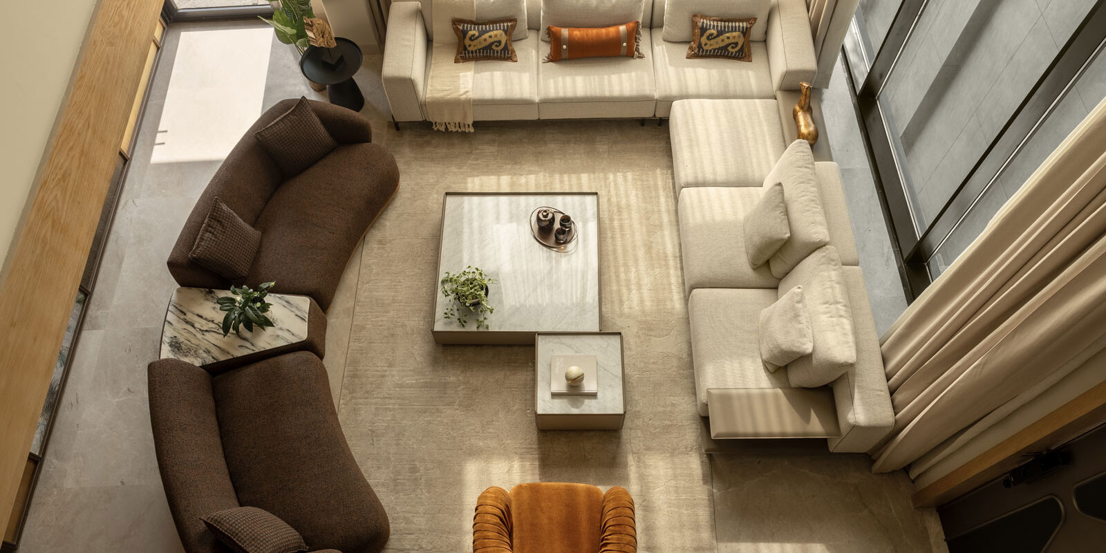 aerial view of livingroom in luxurious gurugram home designed by house and beyond
