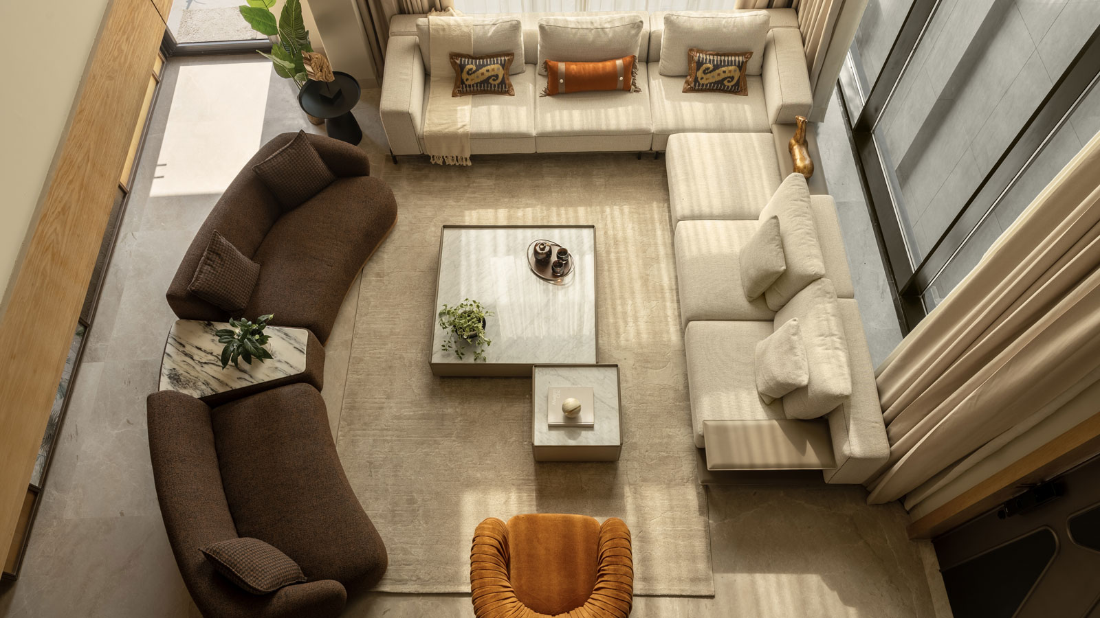 aerial view of livingroom in luxurious gurugram home designed by house and beyond