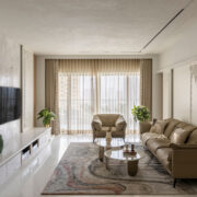 livingroom of luxurious four bedroom thane apartment designed by AND spaces
