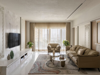 livingroom of luxurious four bedroom thane apartment designed by AND spaces