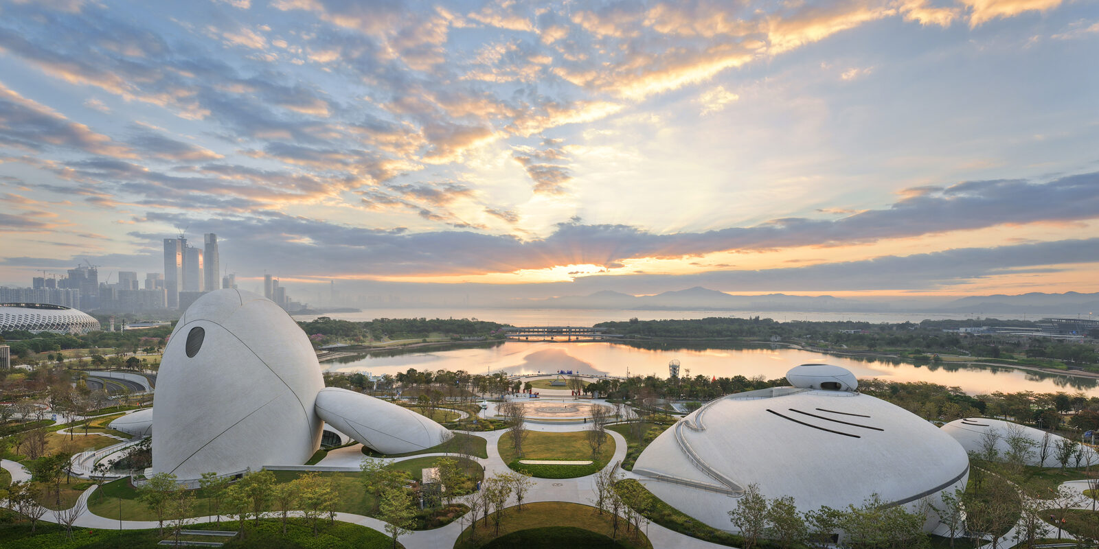 shenzhen bay culture square designed by MAD architects where the building merges with teh coastline
