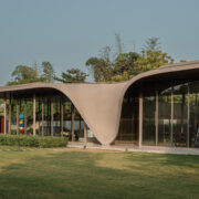 The Dip Pavilion by andblack design studio explores where a home ends and the landscape begins.