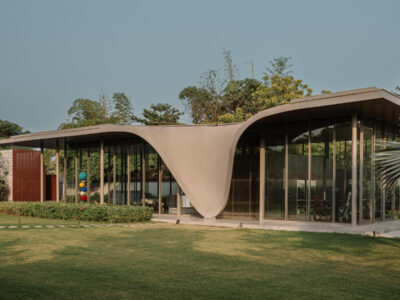 The Dip Pavilion by andblack design studio explores where a home ends and the landscape begins.