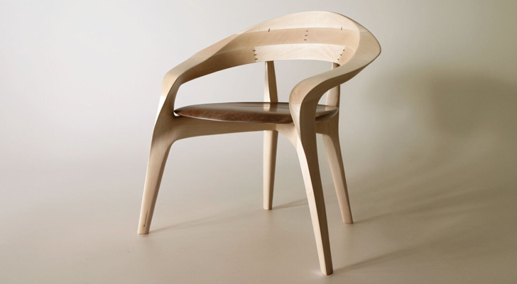 oruha is a sculptural chair designed by Yuya Nakazawa that shifts with light and perspective while remaining deeply comfortable